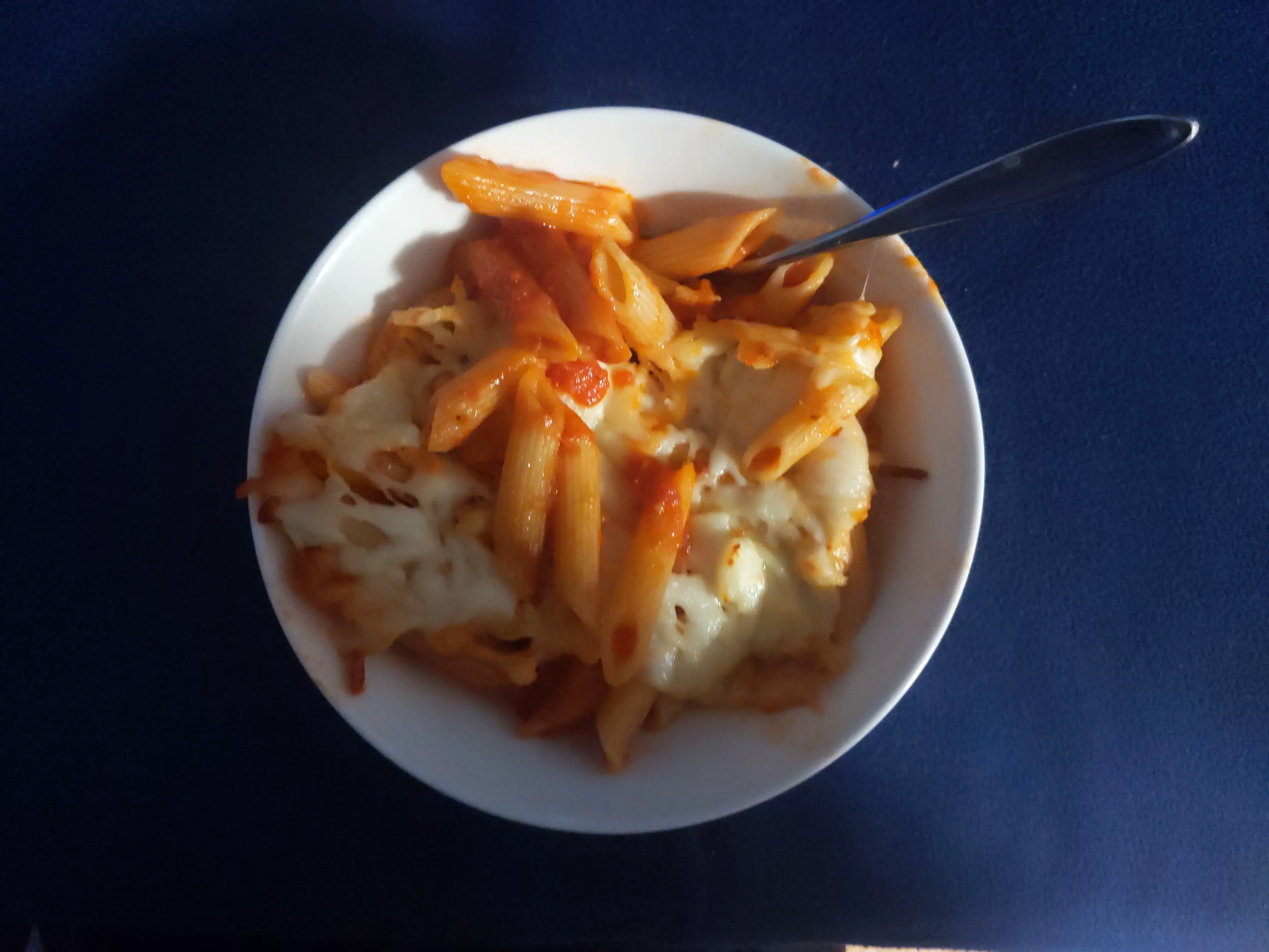 baked mostaccioli in bowl